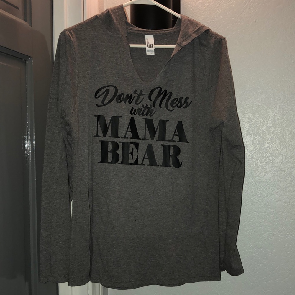 Size medium. Women’s light weight long sleeve shirt with hood! MAMA BEAR 🧸 NWOT